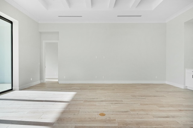 spare room featuring crown molding