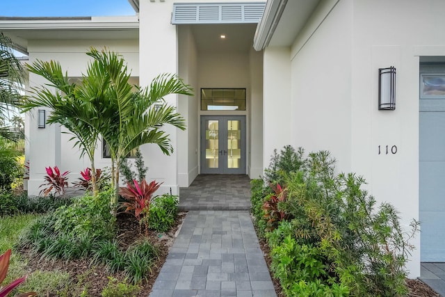 entrance to property featuring french doors