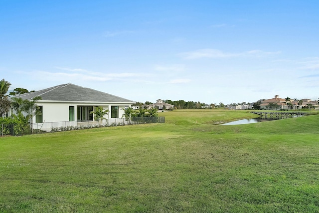 view of yard with a water view