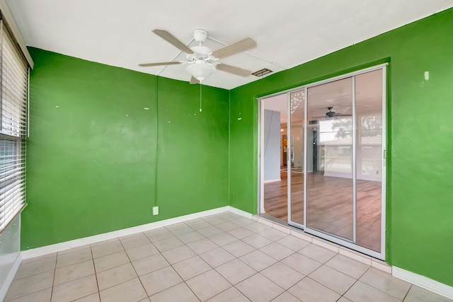 unfurnished room with ceiling fan