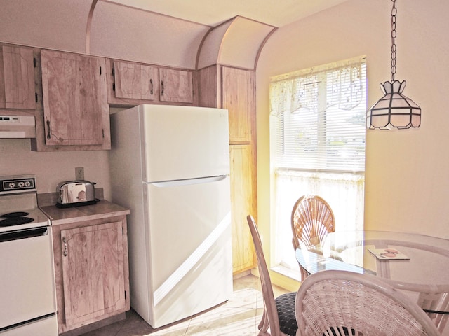 kitchen with extractor fan, range with electric stovetop, decorative light fixtures, and white fridge