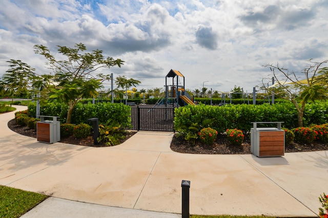 view of property's community featuring a playground