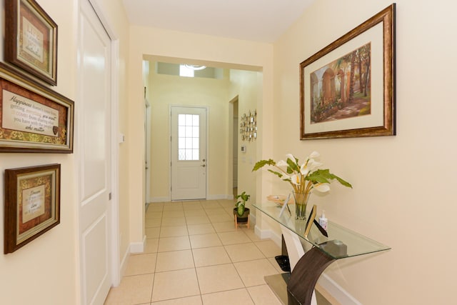 entrance foyer with light tile flooring