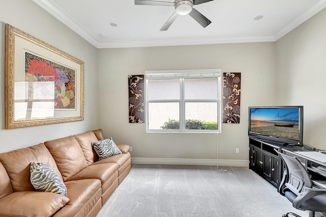 carpeted living room with ceiling fan and crown molding