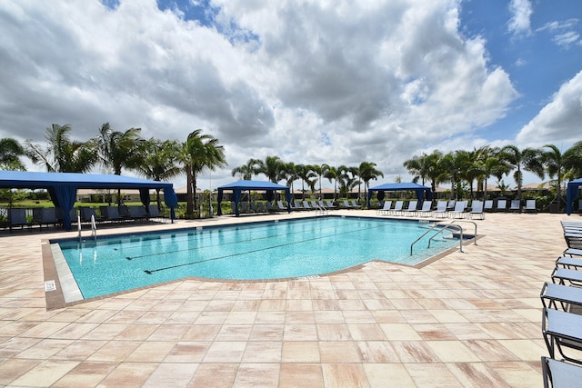 view of swimming pool with a gazebo