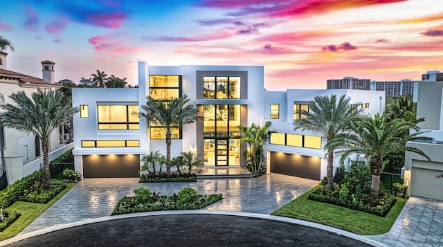 view of front of property with a garage