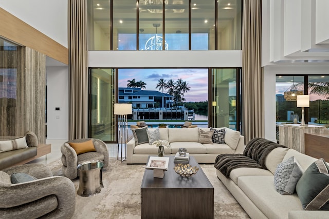 living area featuring a high ceiling