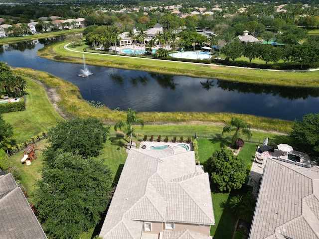 birds eye view of property featuring a water view