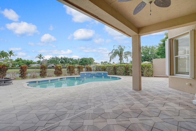 view of pool featuring a patio area and ceiling fan