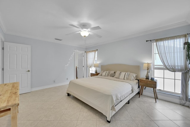 tiled bedroom featuring ornamental molding and ceiling fan