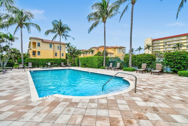 view of swimming pool featuring a patio