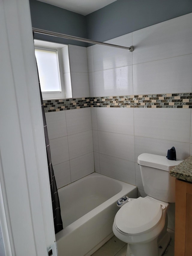 full bathroom with shower / bathtub combination with curtain, toilet, tile flooring, and vanity