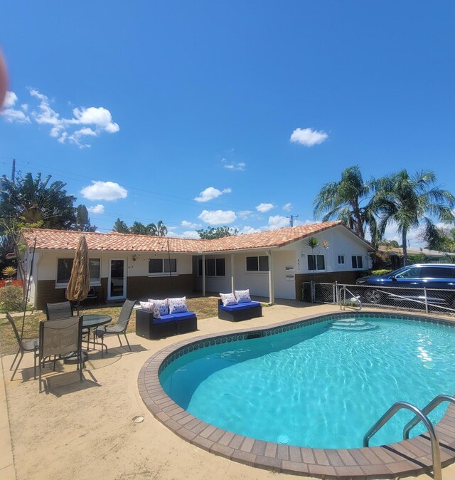 view of pool with a patio area