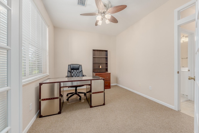 office featuring light colored carpet and ceiling fan