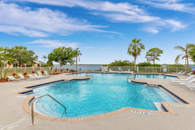 view of swimming pool with a patio area