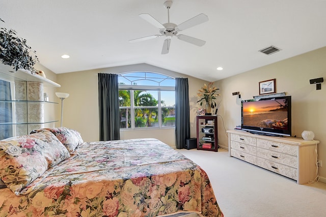 carpeted bedroom featuring ceiling fan and lofted ceiling