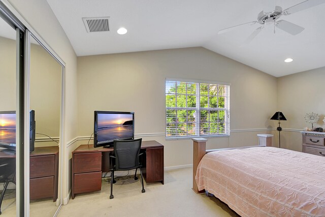 carpeted bedroom featuring ceiling fan and lofted ceiling