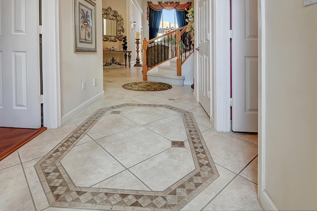 hallway featuring light tile patterned floors