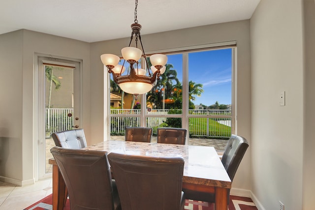 dining area with light tile patterned flooring