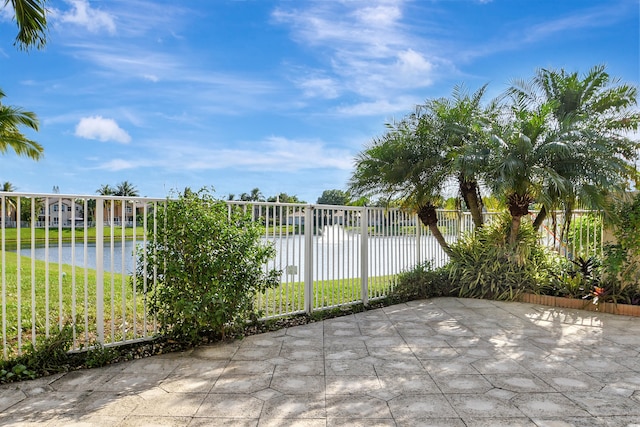 view of patio featuring a water view