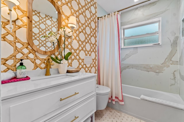 full bathroom with tile floors, toilet, shower / tub combo, and vanity