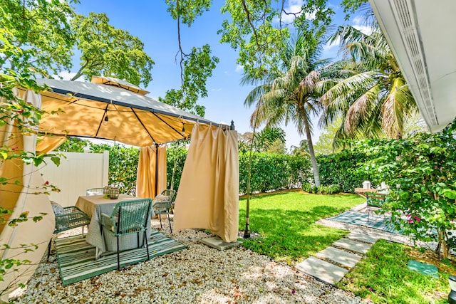 view of yard featuring a patio and a gazebo