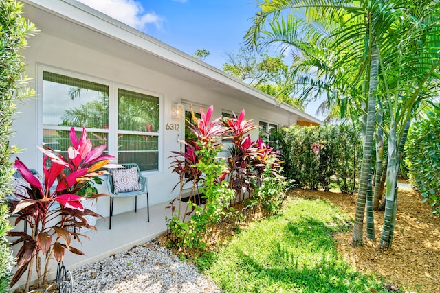 view of property exterior featuring a patio area