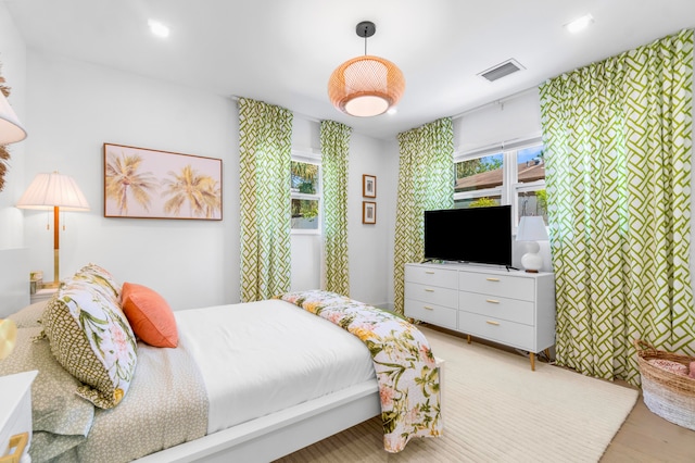 bedroom featuring light hardwood / wood-style floors