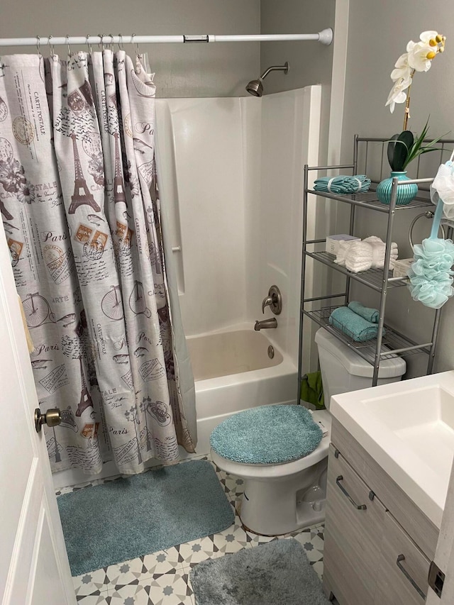 full bathroom featuring vanity, tile flooring, shower / bath combo, and toilet