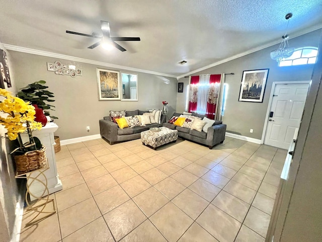 living room featuring light tile floors, a textured ceiling, ceiling fan with notable chandelier, ornamental molding, and vaulted ceiling