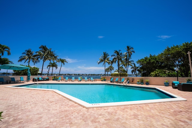 view of pool featuring a patio area