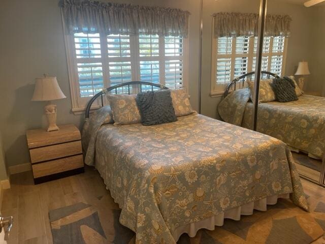 bedroom with light wood-type flooring