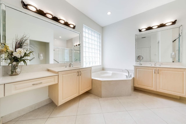 bathroom featuring tile patterned flooring, vanity, and independent shower and bath