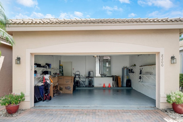 garage featuring electric water heater