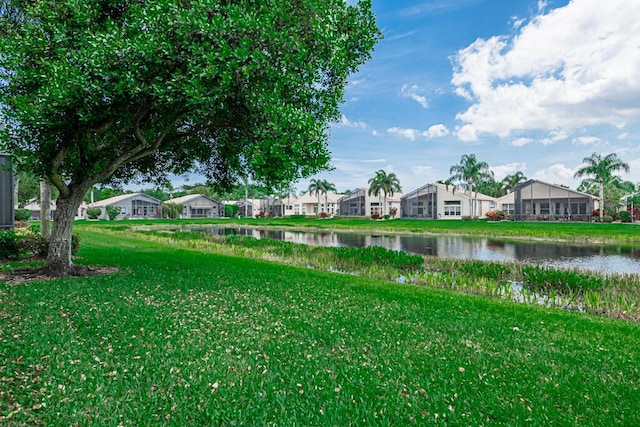 view of yard with a water view