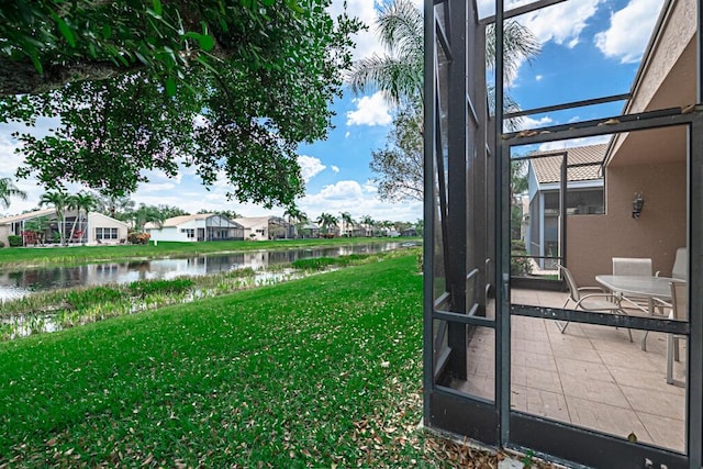 view of yard featuring a water view