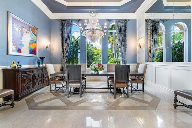 dining space with an inviting chandelier, a tray ceiling, and light tile floors