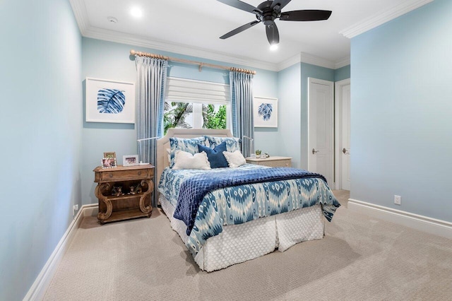 bedroom with light carpet, crown molding, and ceiling fan