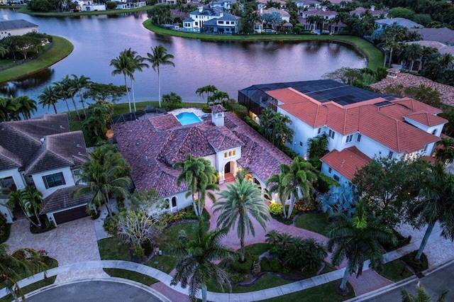 bird's eye view with a water view