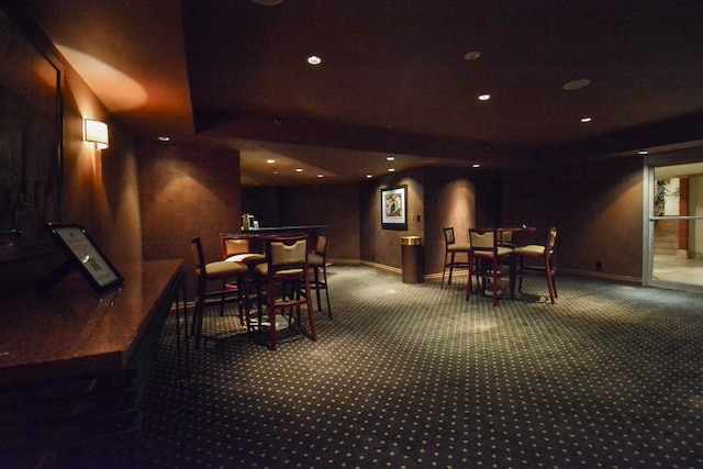 view of carpeted dining space