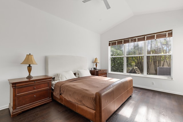 bedroom featuring ceiling fan, dark wood-type flooring, and lofted ceiling