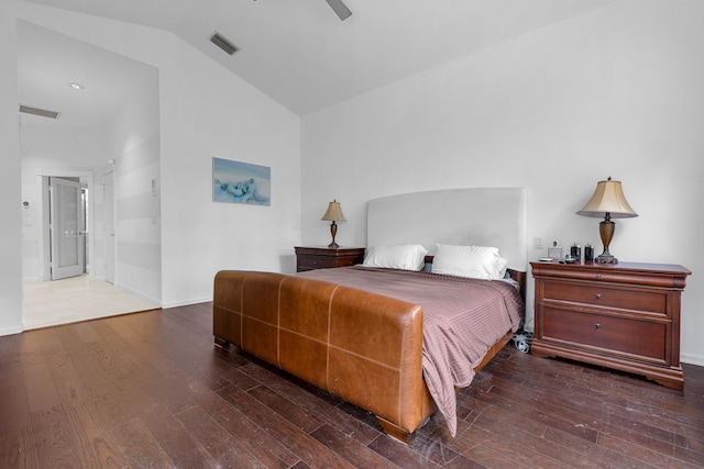 bedroom with dark hardwood / wood-style floors, ceiling fan, and lofted ceiling