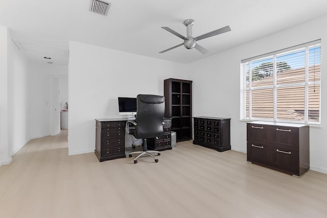 office area with ceiling fan and light hardwood / wood-style flooring