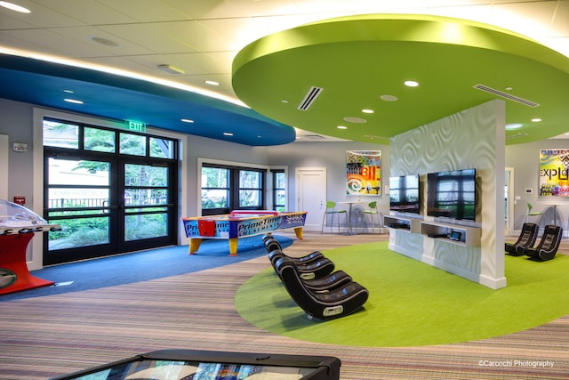 playroom featuring french doors, carpet floors, and plenty of natural light