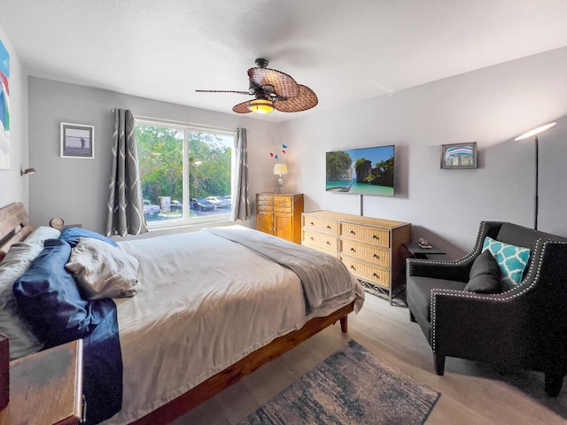 bedroom featuring ceiling fan and light wood-type flooring