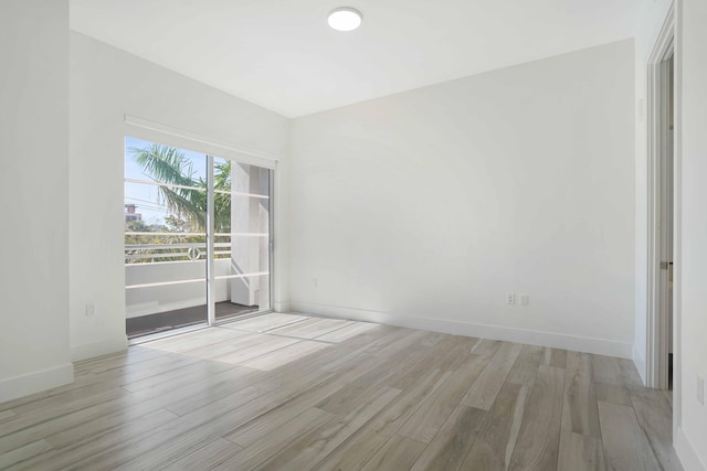 empty room featuring light hardwood / wood-style floors