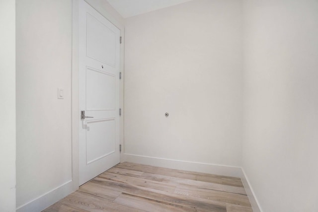 unfurnished room featuring light wood-type flooring