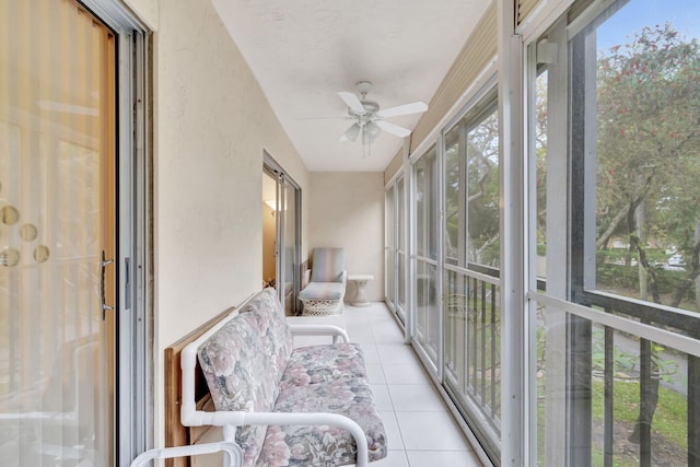 sunroom / solarium with ceiling fan