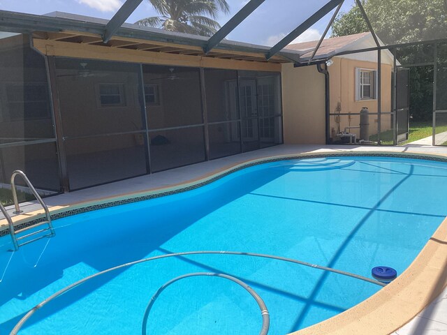 view of pool featuring a lanai