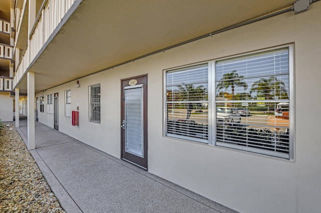 entrance to property with a patio area